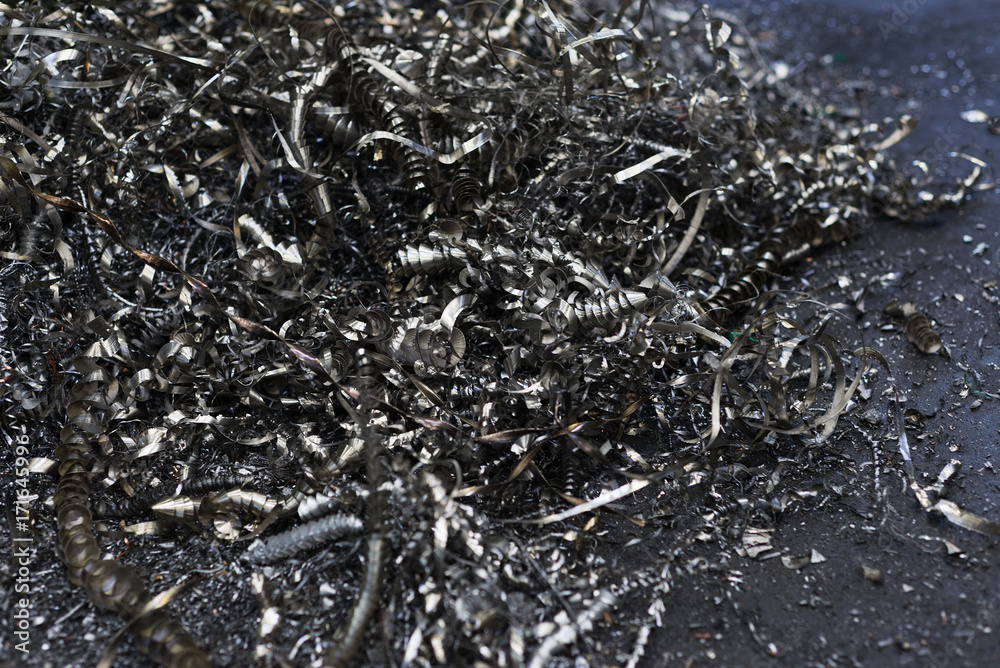 Metal swarf chips scrap cng milling iron close-up Metal swarf chips scrap cng milling iron close-up