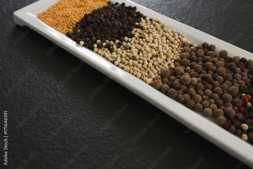 Various spices and seeds in tray Various spices and seeds in tray