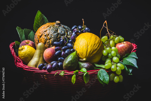 Basket of Fruit Lighted Up in Italian Baroque Style photo