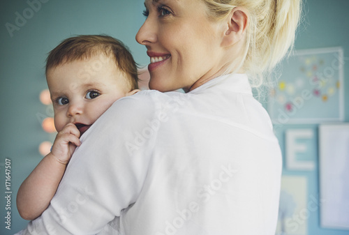 Beautiful Woman Holding a Baby