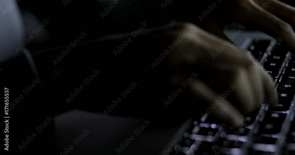 Typing on keyboard at night Typing on keyboard at night