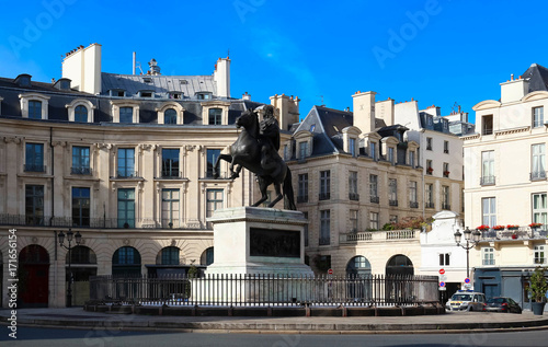 Louis XIV statue in Place des Victoires in Paris, France.