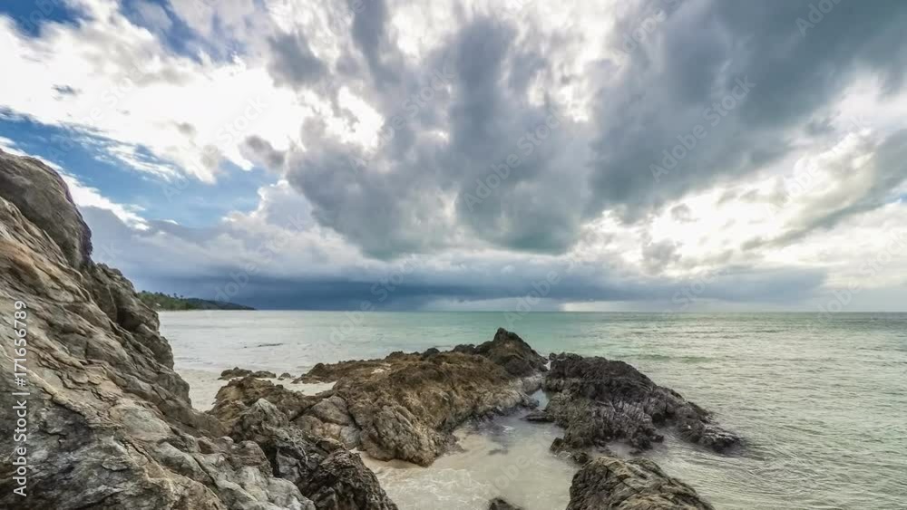 Storm is coming over the sea. View through the rocks Storm is coming over the sea. View through the rocks