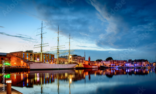 DUNKERQUE, FRANCE - JULY 22, 2017: Night falling on three historic ships in front of the port museum in the 