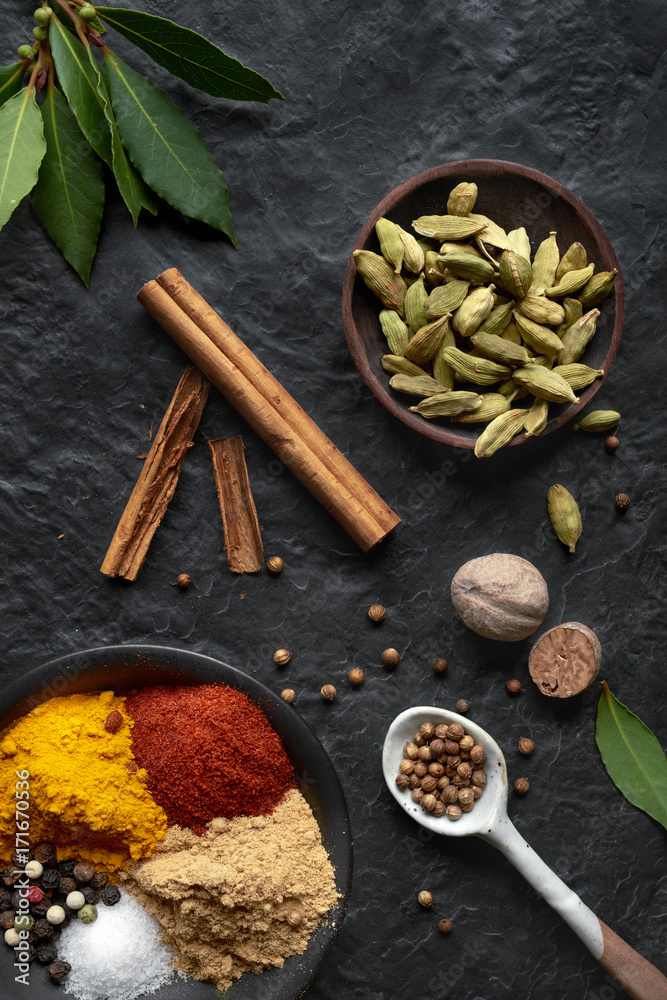 Indian spices on dark background Indian spices on dark background