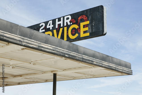 Abandoned gas station in Mojave Desert, near Surprise Valley, CA photo