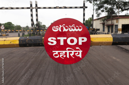 STOP written in Railway crossing photo