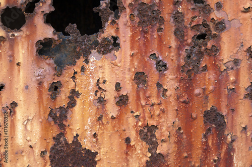 Rusty corrosion of metal due to prolonged exposure with open air