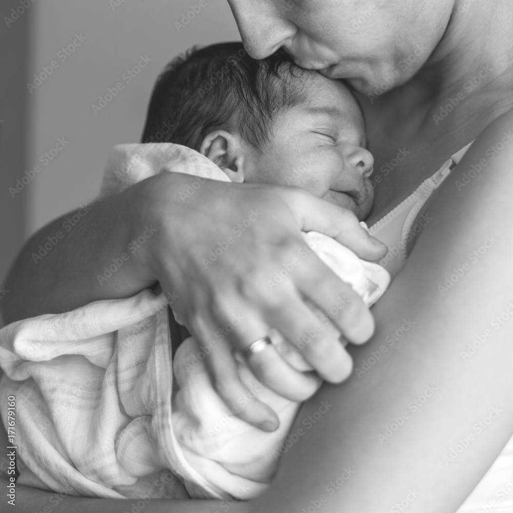 Mother kissing her son Mother kissing her son