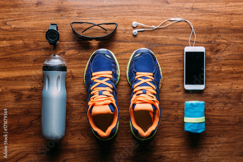 Running equipment and accessories arranged on floor photo