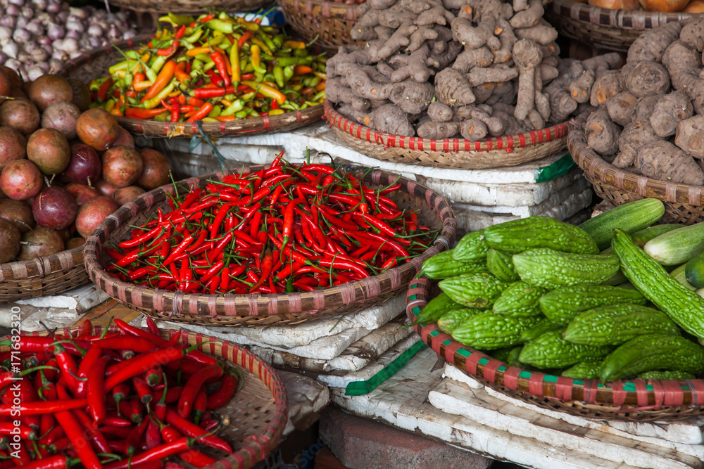 tropical spices and fruits sold at a local market in Hanoi (Vietnam)