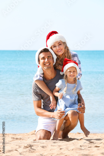 Young couple with cute girl...