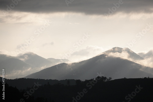 The cloud is floating above the mountains after a rain