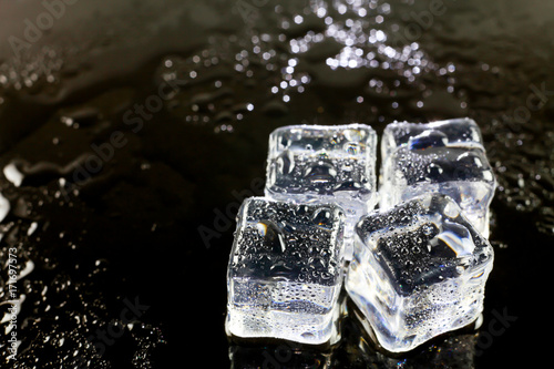 ice cubes on black background.