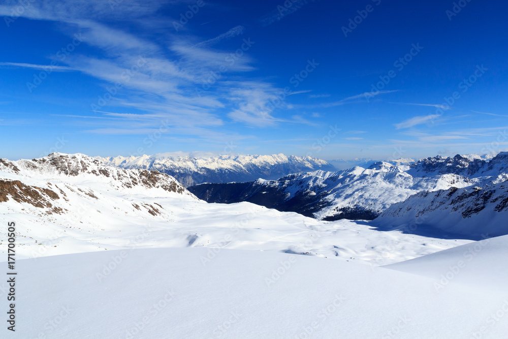 Mountain panorama with snow and blue sky in winter in Stubai Alps, Austria