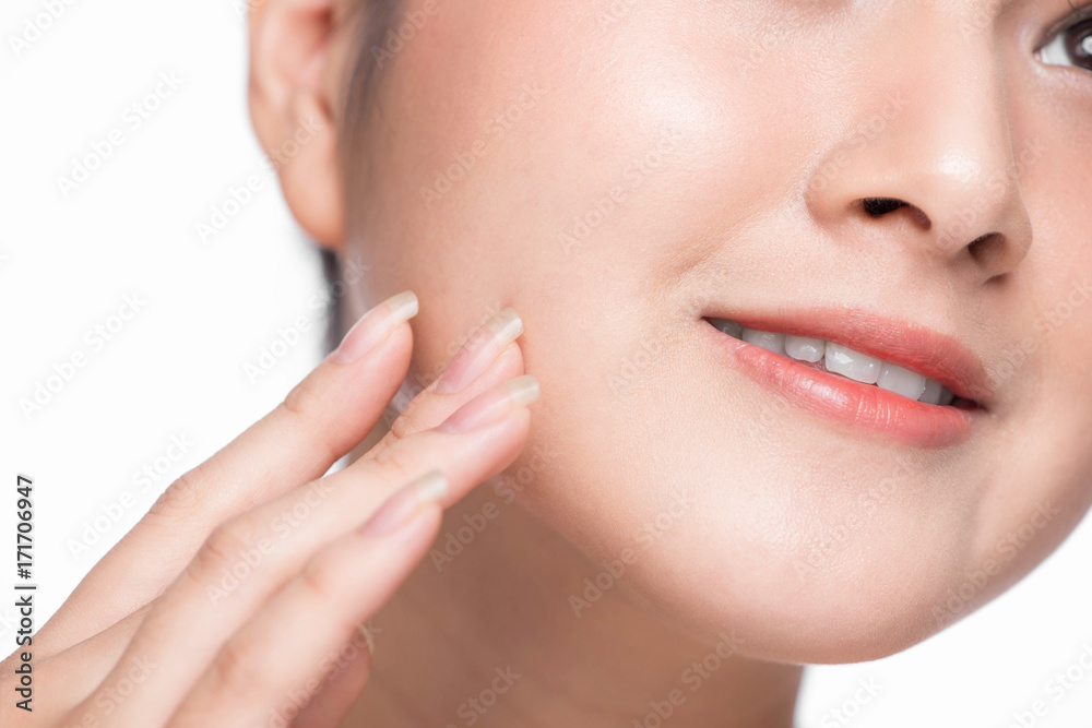 Skin care. Beautiful Young Asian Woman with Clean Fresh Skin touch her face Skin care. Beautiful Young Asian Woman with Clean Fresh Skin touch her face