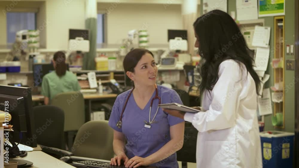 Nurse and Doctor modern collaboration in hospital. Nurse and Doctor modern collaboration in hospital.