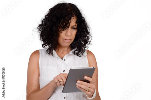 Woman using digital tablet.