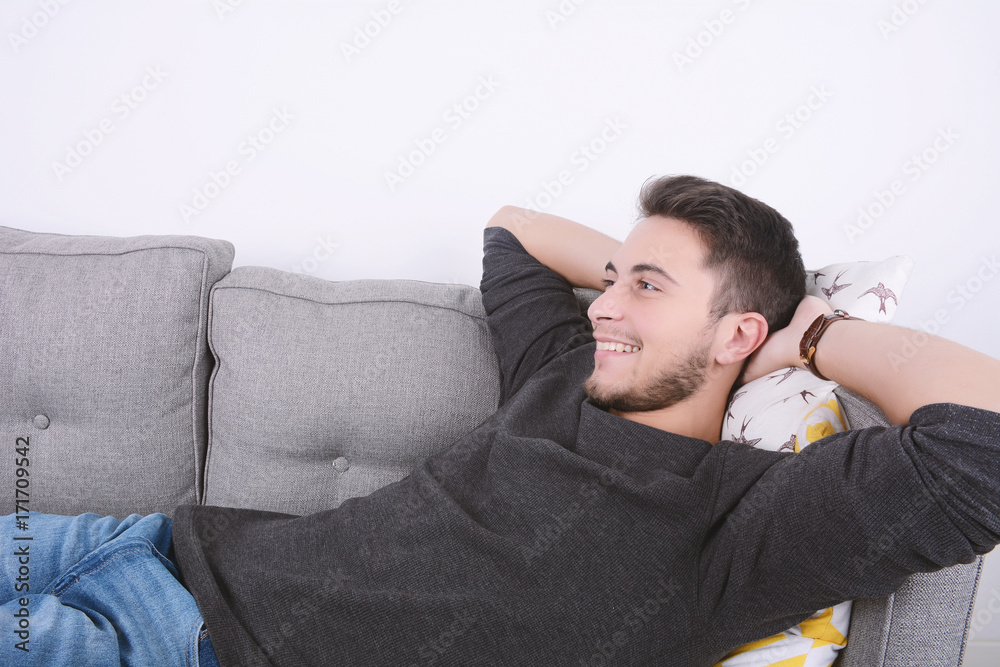 Man lying on couch.