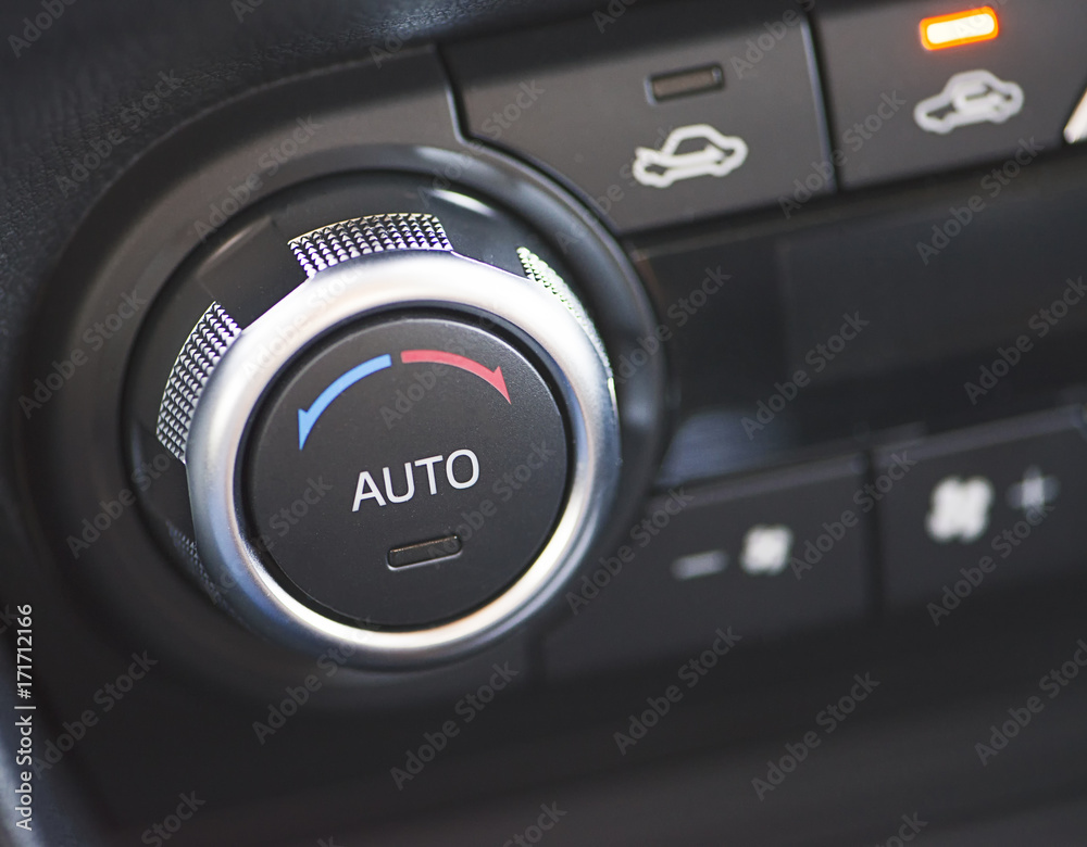Car air conditioner button. Car dashboard.