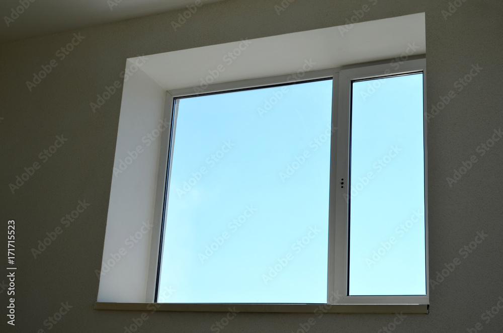 window opening in the building overlooking the sky window opening in the building overlooking the sky
