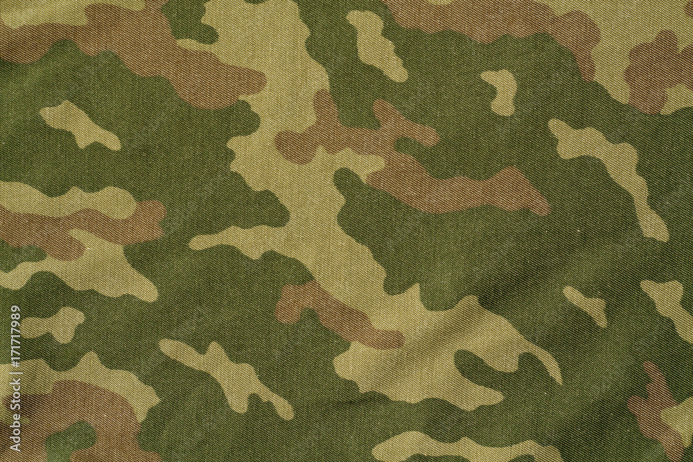 Fototapeta premium Textile camouflage uniform color background pattern.