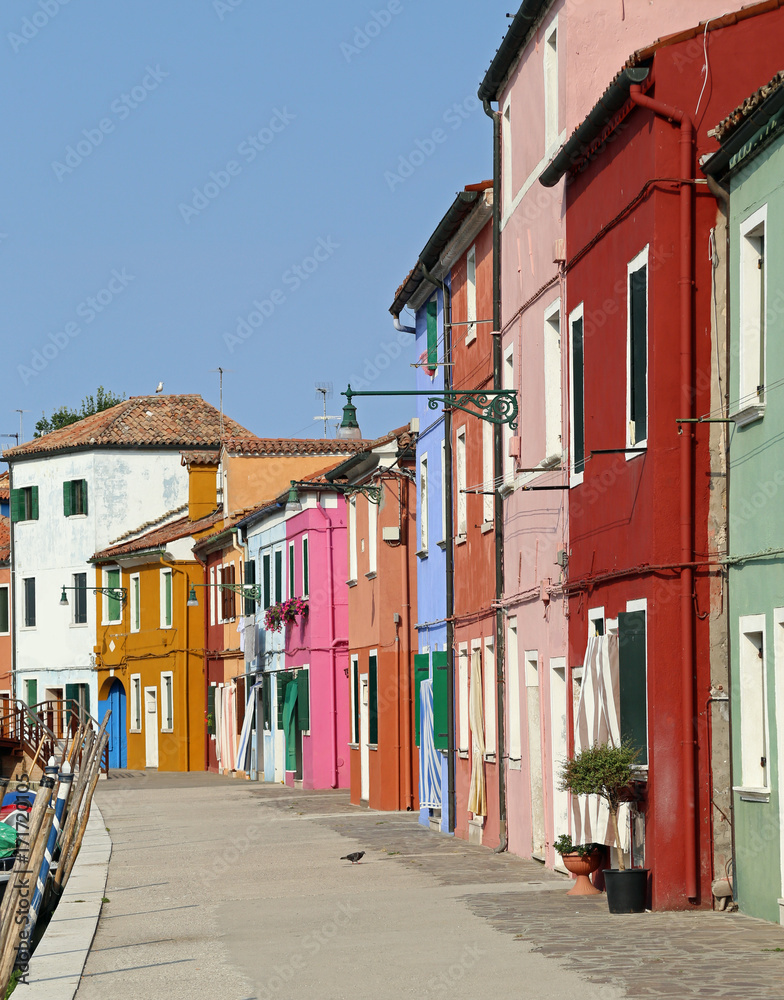 vivid colored houses on the island of Burano in Venice