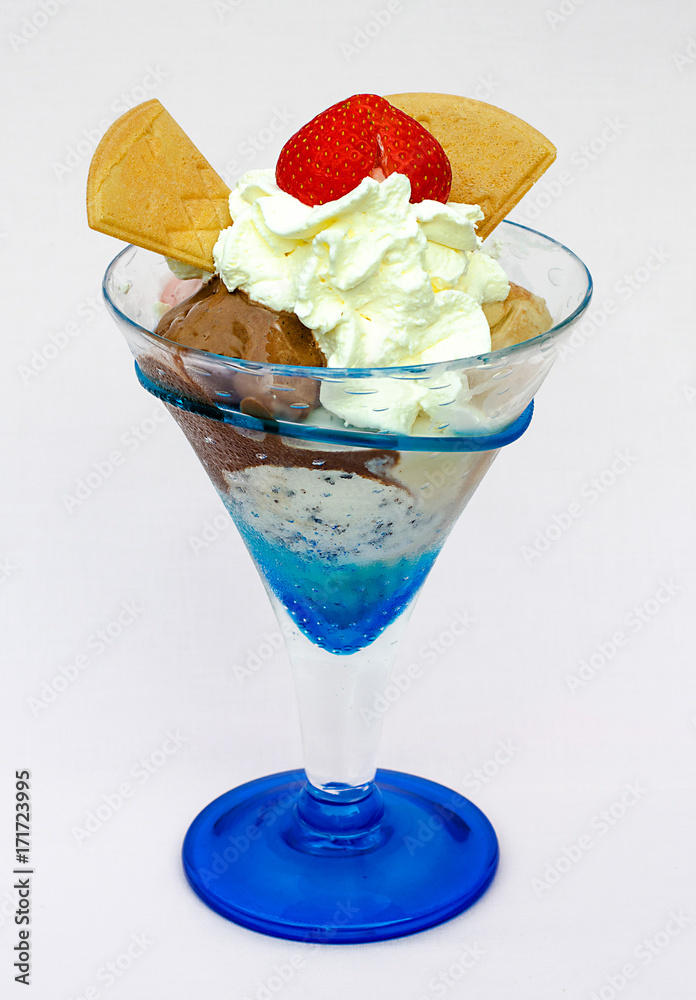 Ice Cream In The Cup with whip cream on White Background. Selective focus. Ice Cream In The Cup with whip cream on White Background. Selective focus.