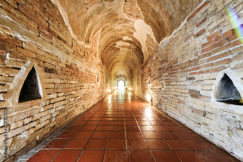 Walkway in the tunnel at Wat Au Mong, Chiang Mai, Thailand.