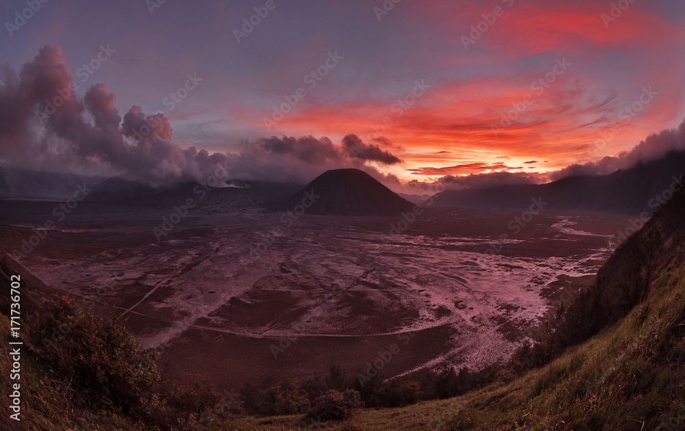 Mt Bromo volcanic eruption during sunset, Indonesia