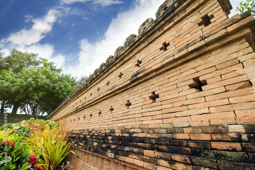 wall red brick,  nature background at temple Thailand