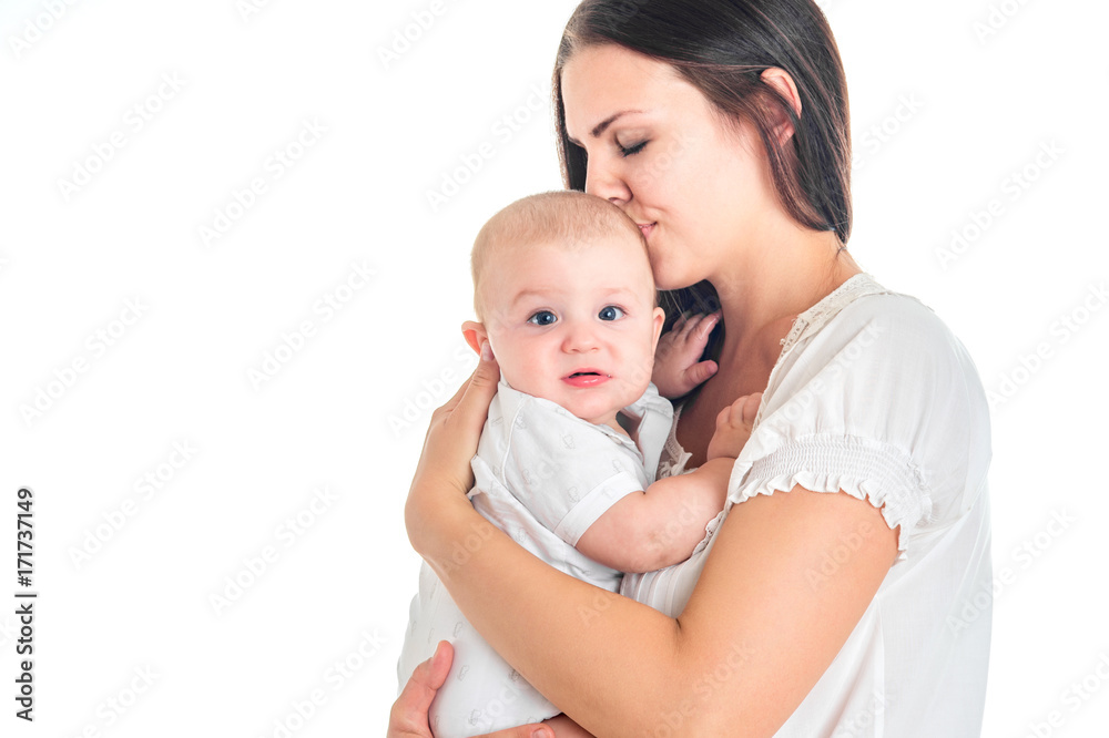 Mother and baby kissing and smiling. Happy family. White background