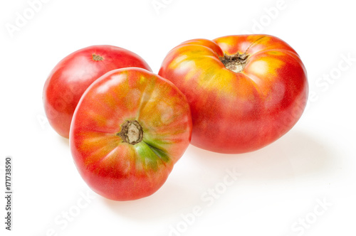 Delicious ripe tomatoes, isolated on white