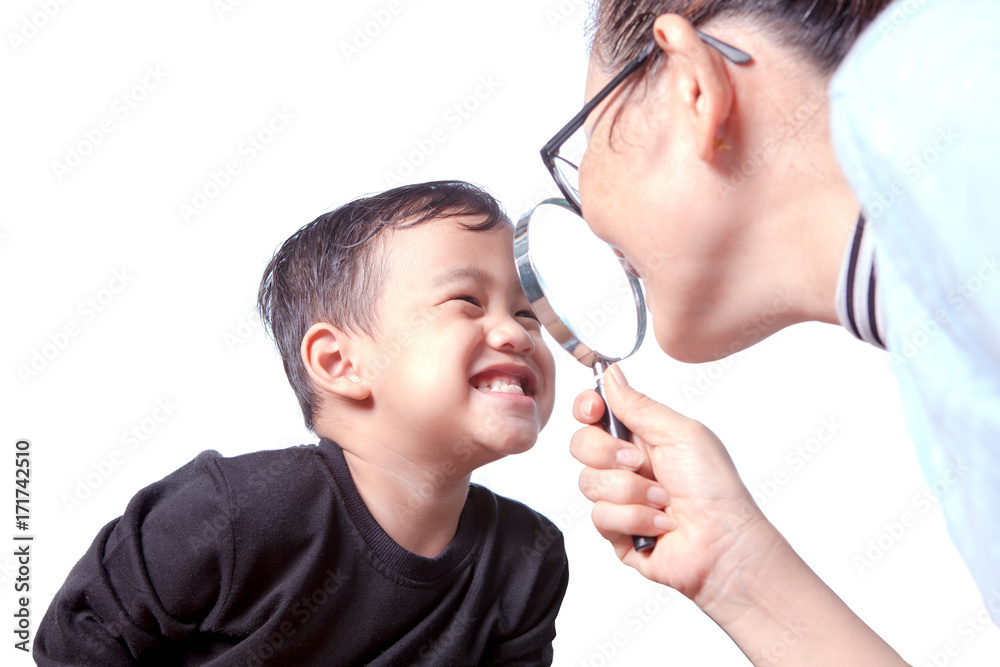 asian children toothy smiling face with happiness emotion and female dentist close up magnifier lens to teeth asian children toothy smiling face with happiness emotion and female dentist close up magnifier lens to teeth
