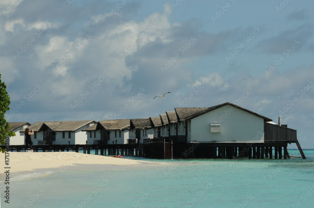 Holiday water huts over sea in the Maldives