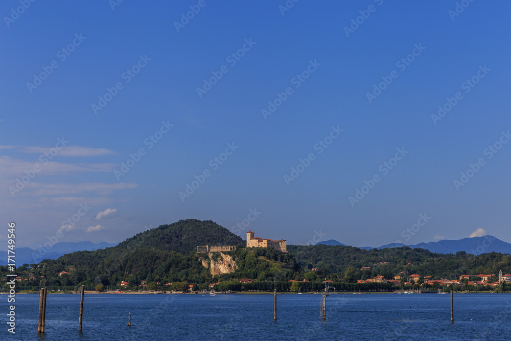 shores of Lake Maggiore with plants, sun and boats