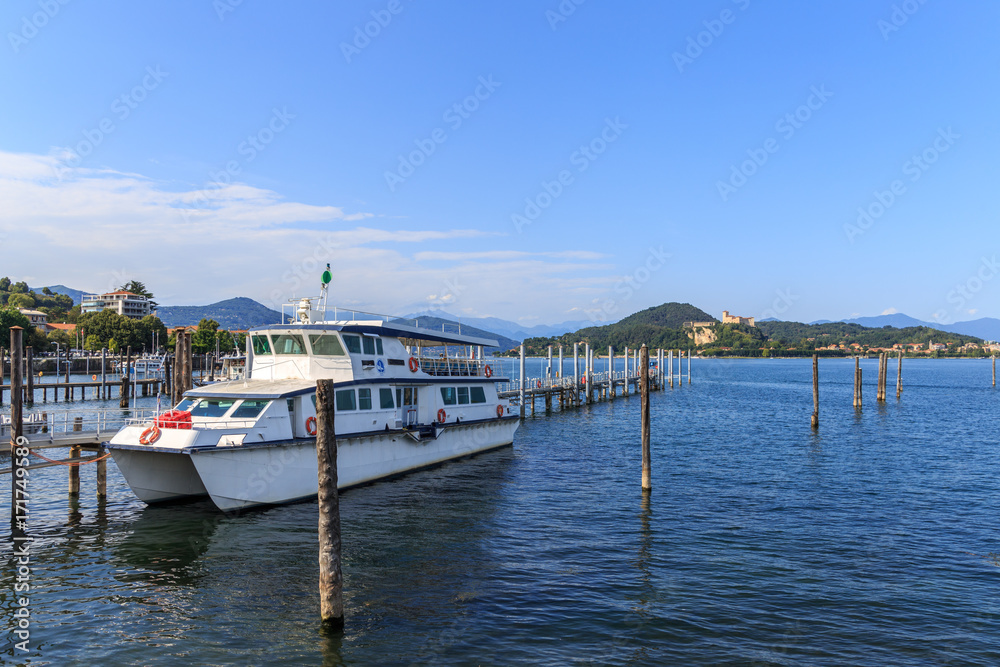 shores of Lake Maggiore with plants, sun and boats