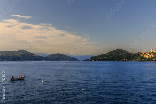 view of Lake Maggiore with mountain background in sunny afternoon © valentidaze