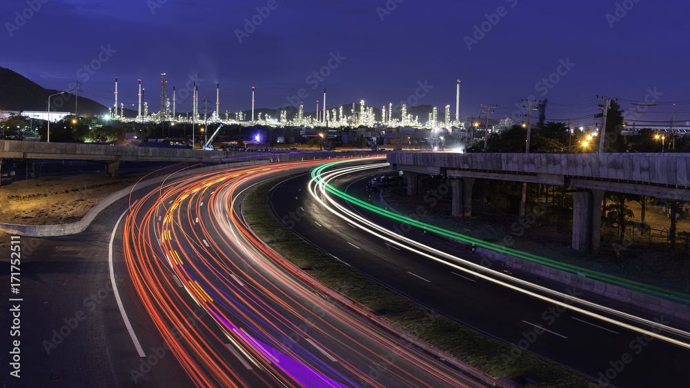 beautiful lighting of oil refinery plant in heavy petrochemical industry estate use for power,Road to the oil refiner on blue sky in twilight time background