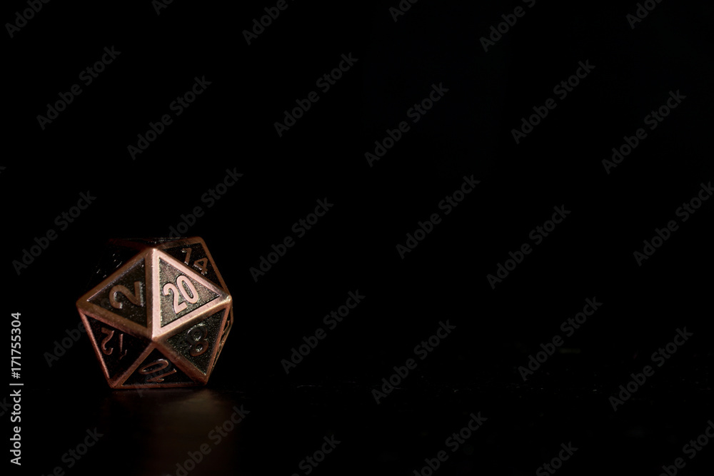 Fototapeta premium A polyhedral twenty sided dice used for role playing games such as Dungeons & Dragons.
