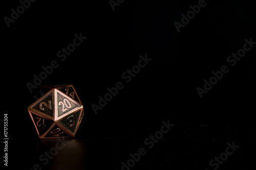 A polyhedral twenty sided dice used for role playing games such as Dungeons & Dragons.