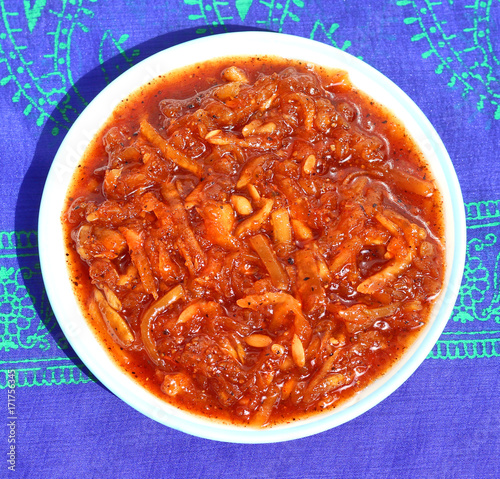 Indian homemade Raw Mango Murabba prepared in sugar and spices. A sweet alternative to pickles.