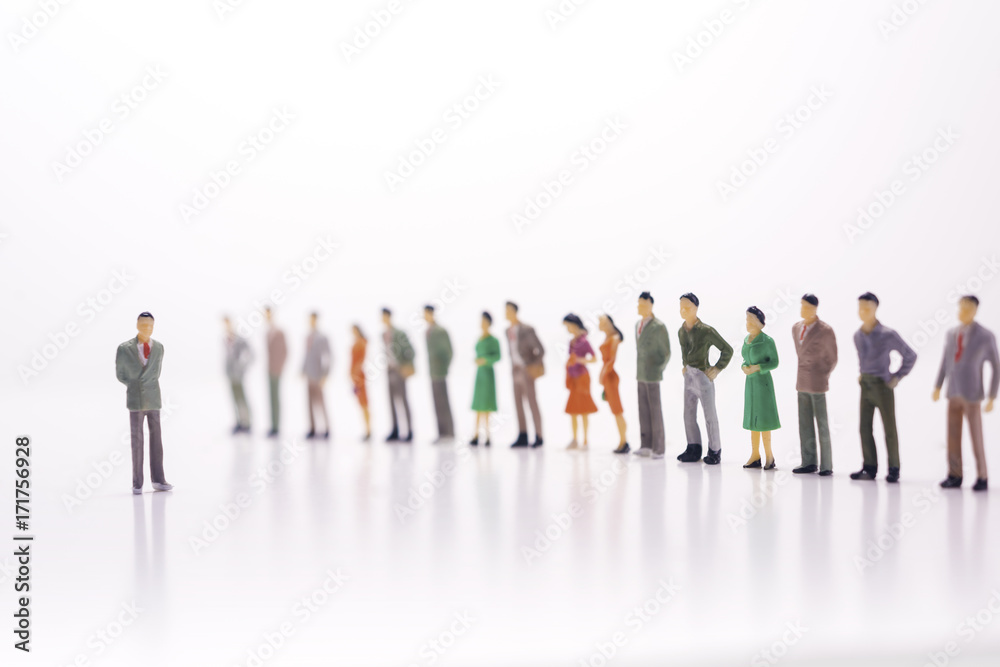 Miniature people, boss against the line of people over white background. Miniature people, boss against the line of people over white background.