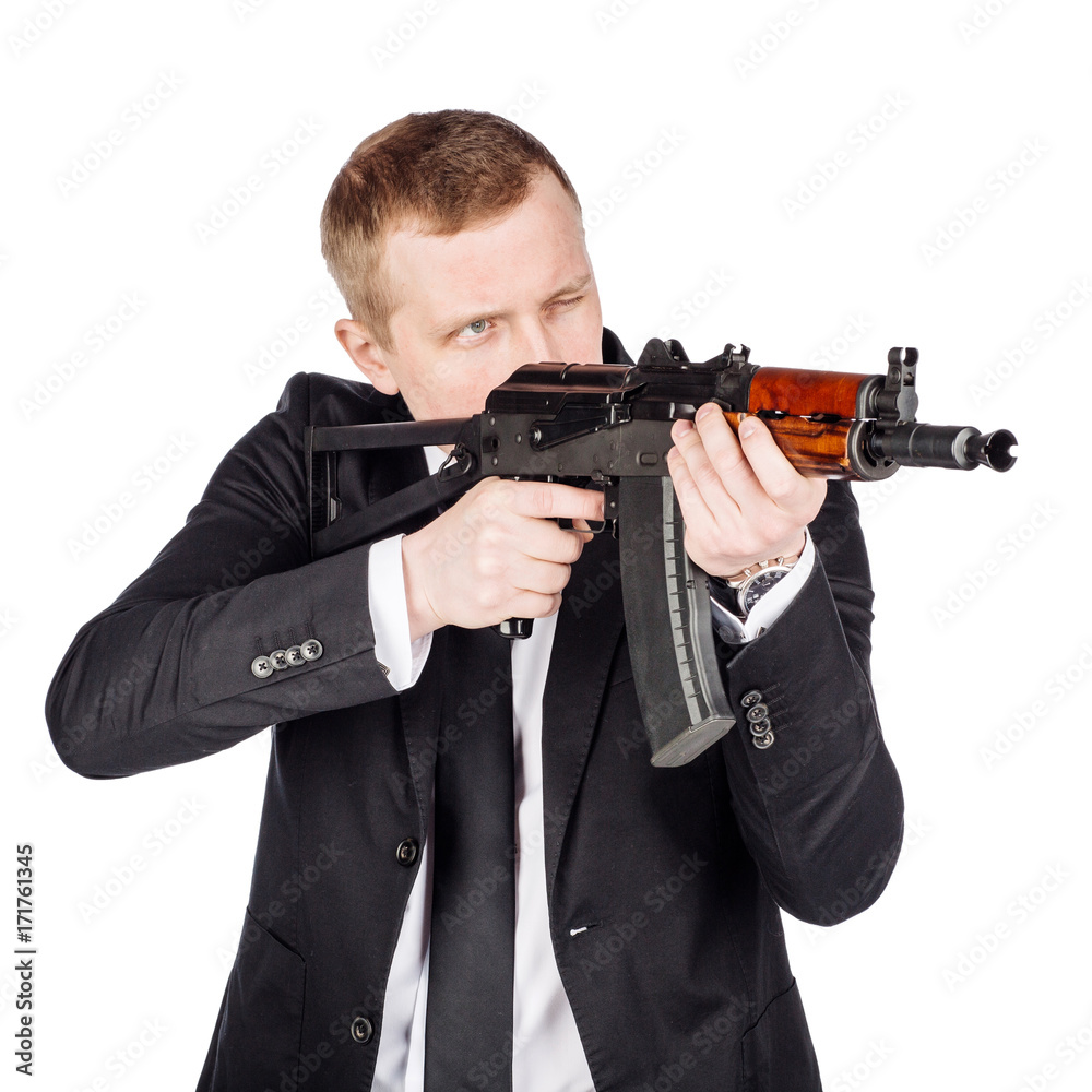 Secret aghent or spy holds rifle with silincer in hand. Isolated on white background. Secret aghent or spy holds rifle with silincer in hand. Isolated on white background.