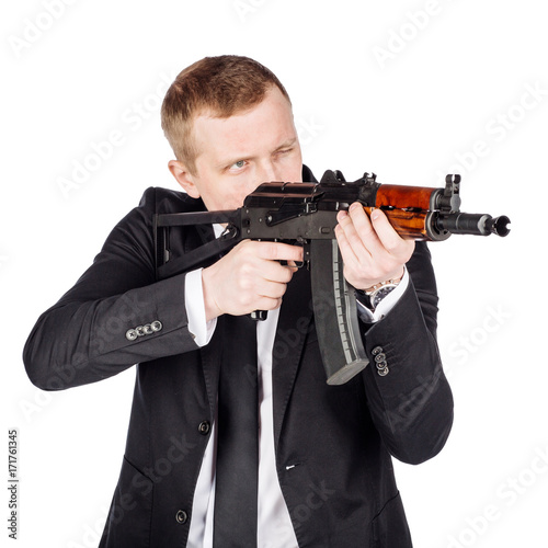 Secret aghent or spy holds rifle with silincer in hand. Isolated on white background.