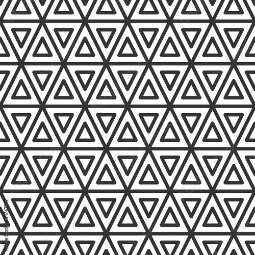 Triangular tile. Geometric seamless pattern.