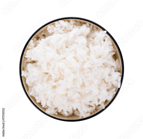 Rice in a bowl on a white background. top view