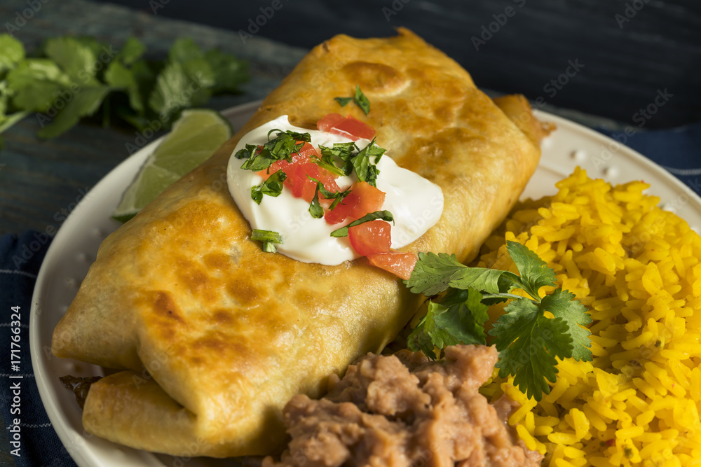 Chimichanga, Chimichanga is a deep-fried burrito that is po…