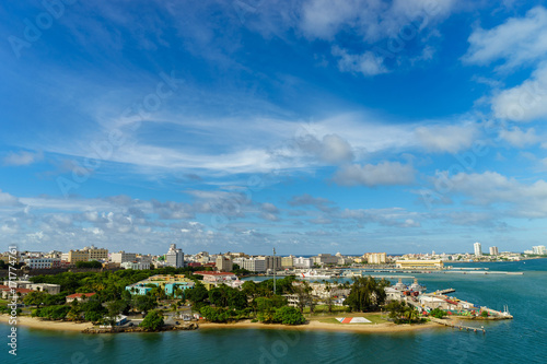 Scenic view of historic colorful Puerto Rico city in distance from the sea