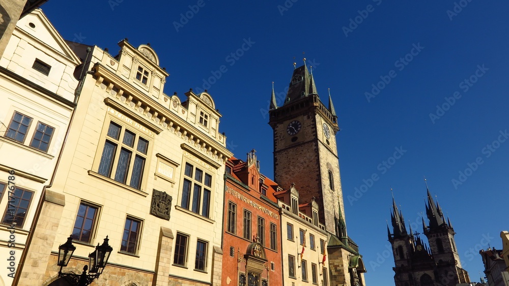Fototapeta premium Prague Astronomical Clock and Tyn Church in Old Town Square with blue sky 